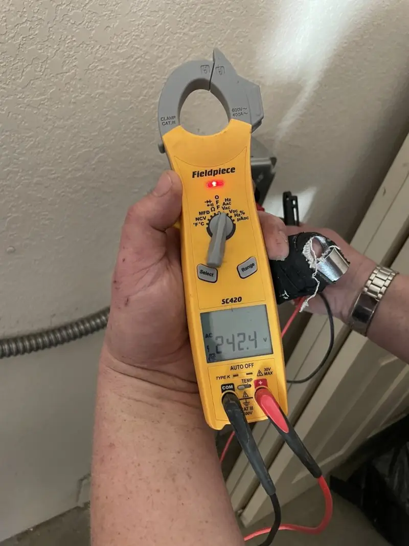 Voltage testing with clamp meter during Aluminum Wiring Replacement in Franklin